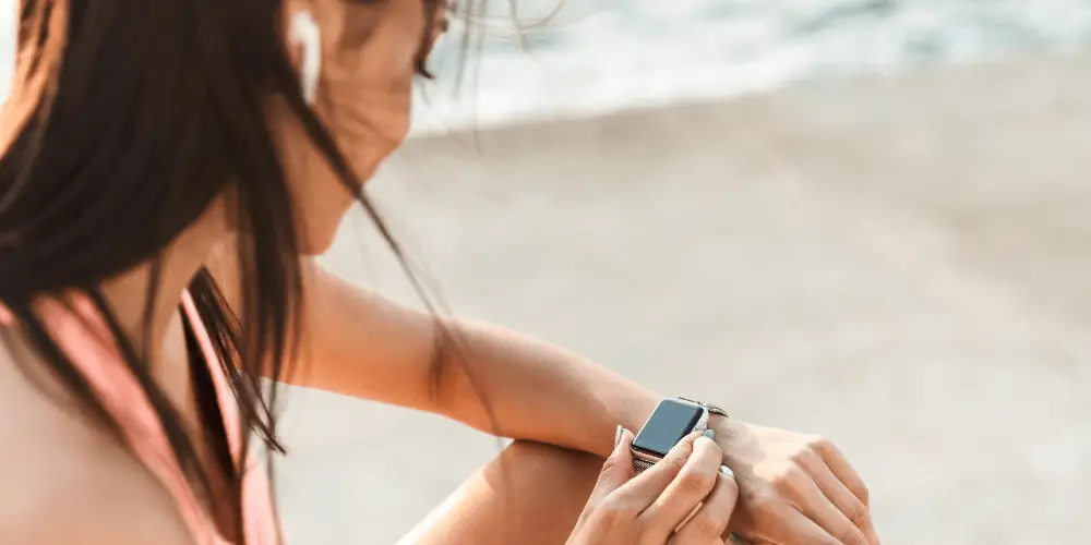 a runner with an apple watch