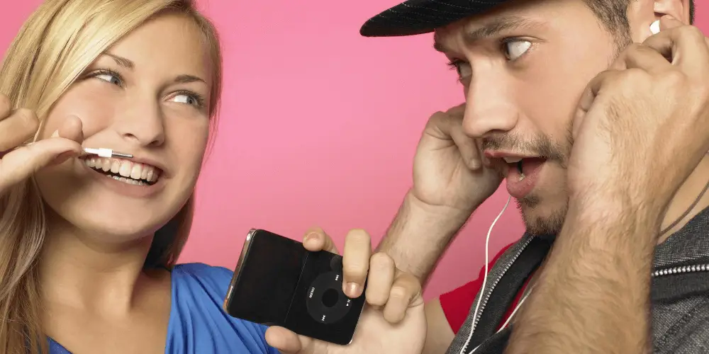 A couple holding a running device