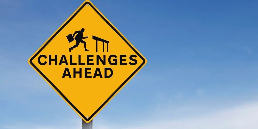 challenges ahead sign